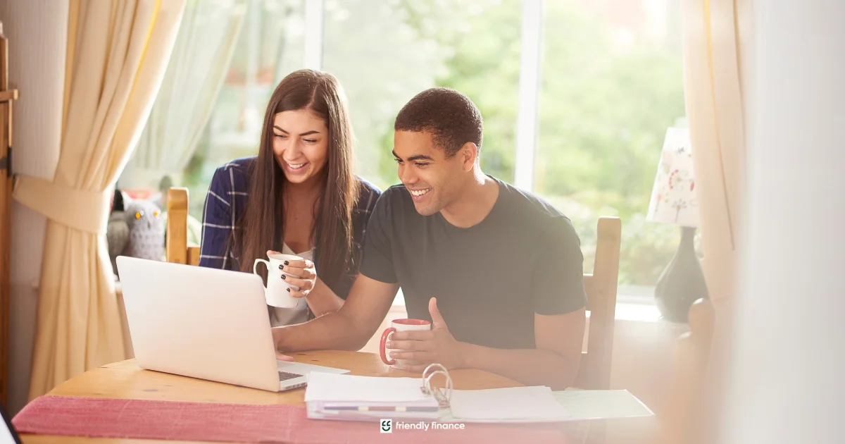 Person reviewing receipts and bills with a tablet and clipboard on desk