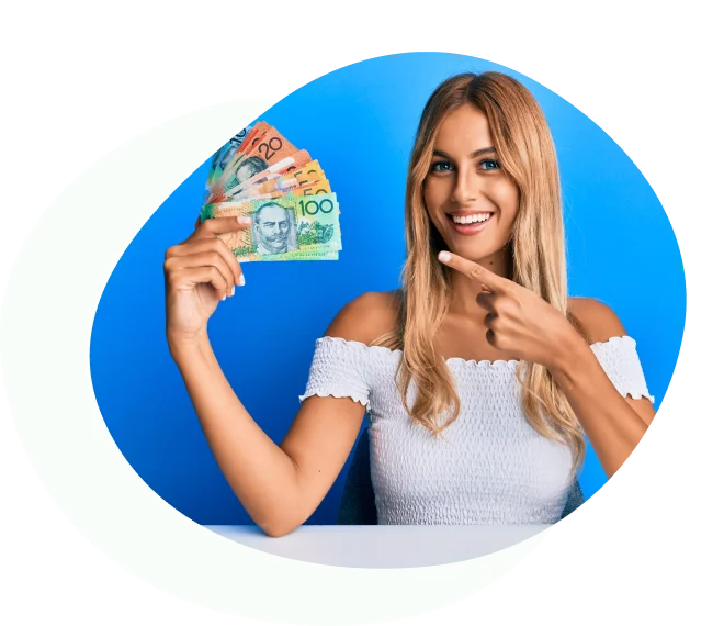 Blonde woman pointing at a fan of Australian banknotes